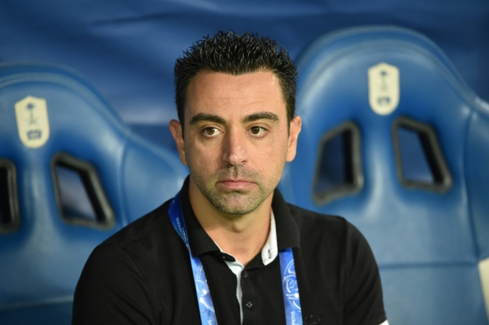 Xavi debutó con 18 años en Old Trafford. AFP