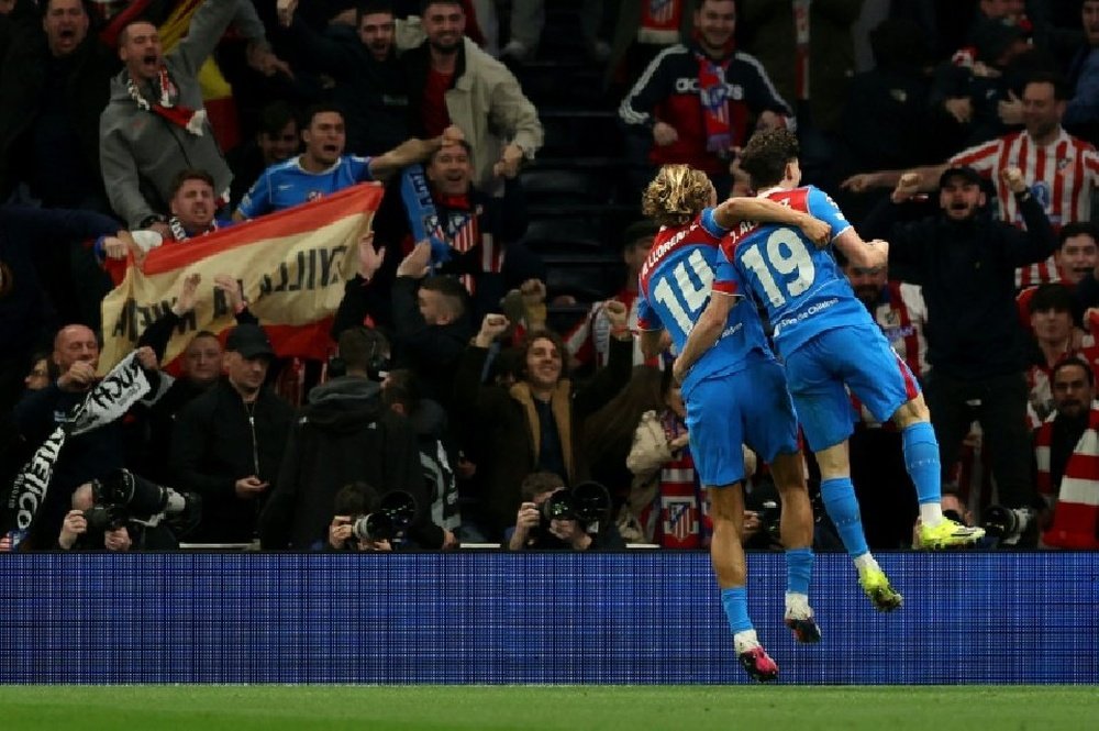 Les joueurs de l'Atlético de Madrid célèbrent lors de leur match de Ligue des Champions contre Tottenham. AFP Adrian Dennis