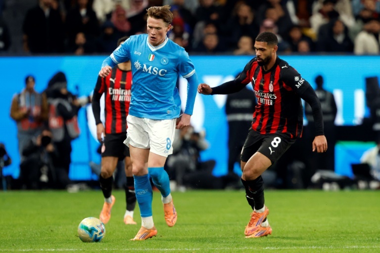 AC Milan visit Napoli as Italy licks its World Cup wounds