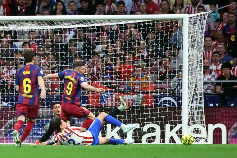 Lewandowski claims leaders Barca vital Liga win at Atletico