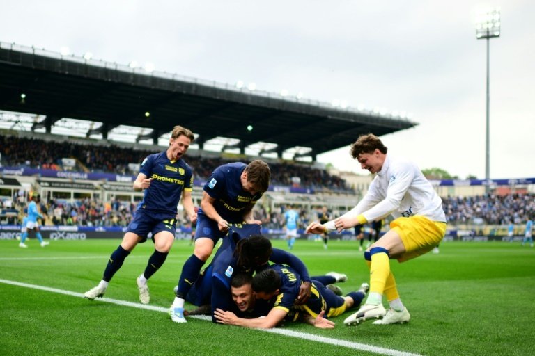 Gabriel Strefezza (C) netted the opener for Parma which dents Napoli's Serie A title defence. AFP