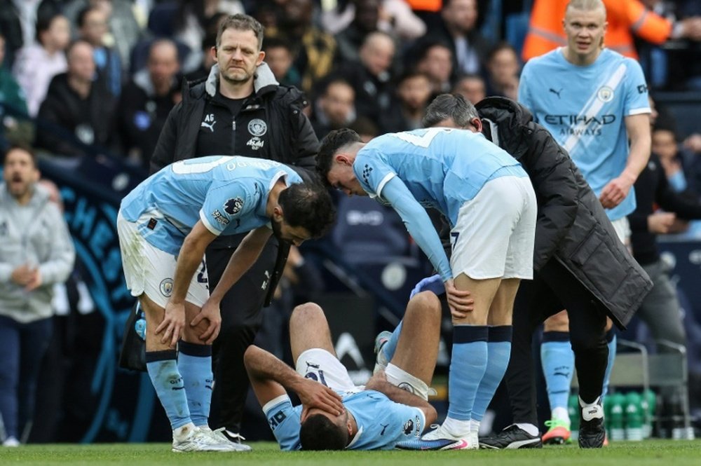 Rodri (C) s'est blessé lors de la victoire 2-1 de Manchester City contre Arsenal en Premier League. AFP/Archives Darren Staples