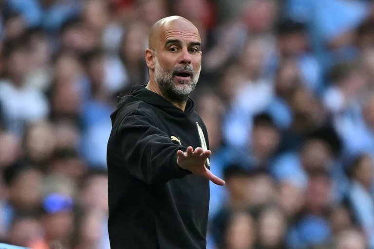 Manchester City, l'équipe de Pep Guardiola, est devancée par Arsenal dans la course au titre de Premier League. AFP Ben Stansall