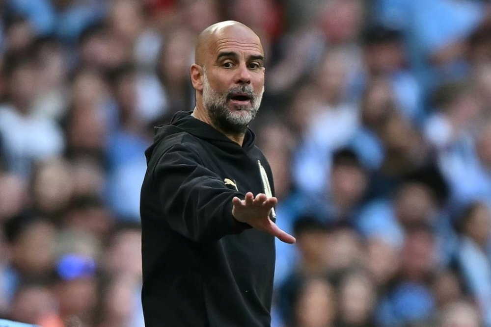Manchester City, l'équipe de Pep Guardiola, est devancée par Arsenal dans la course au titre de Premier League. AFP Ben Stansall