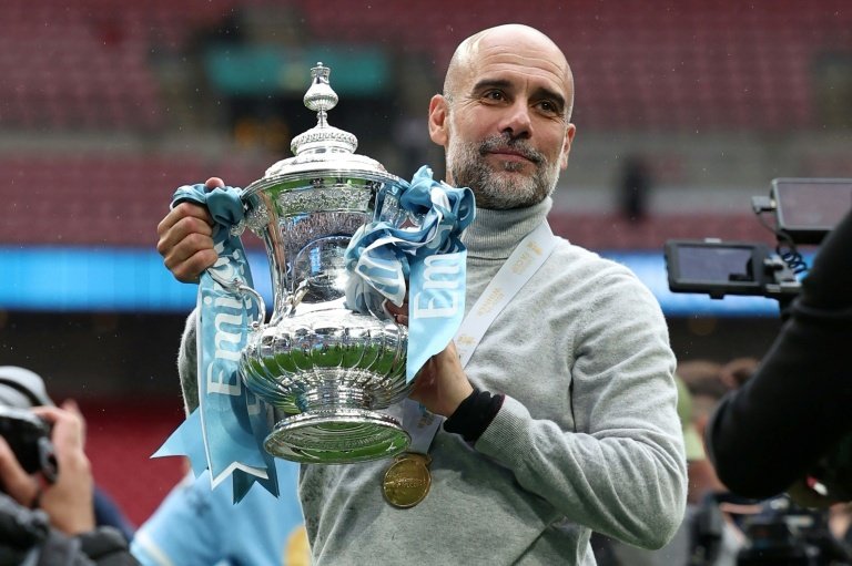 Les plus beaux moments de Pep Guardiola à Manchester City. AFP Adrian Dennis