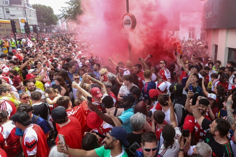Arsenal set aside loss to PSG with bus parade celebrating Premier League crown
