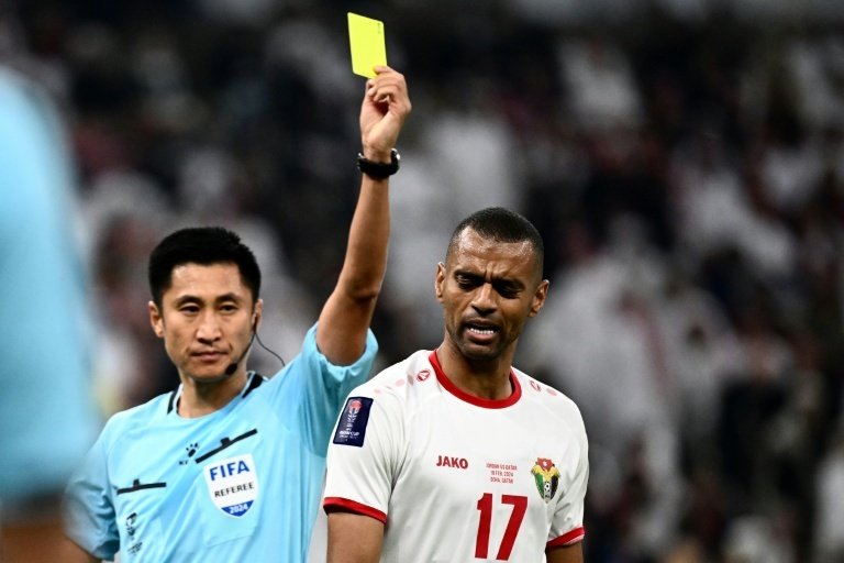 Chinese football fans left without a national team to support at the World Cup have turned to referee Ma Ning - nicknamed "Card Master" for his enthusiasm in booking players - as the country's representative for the tournament.