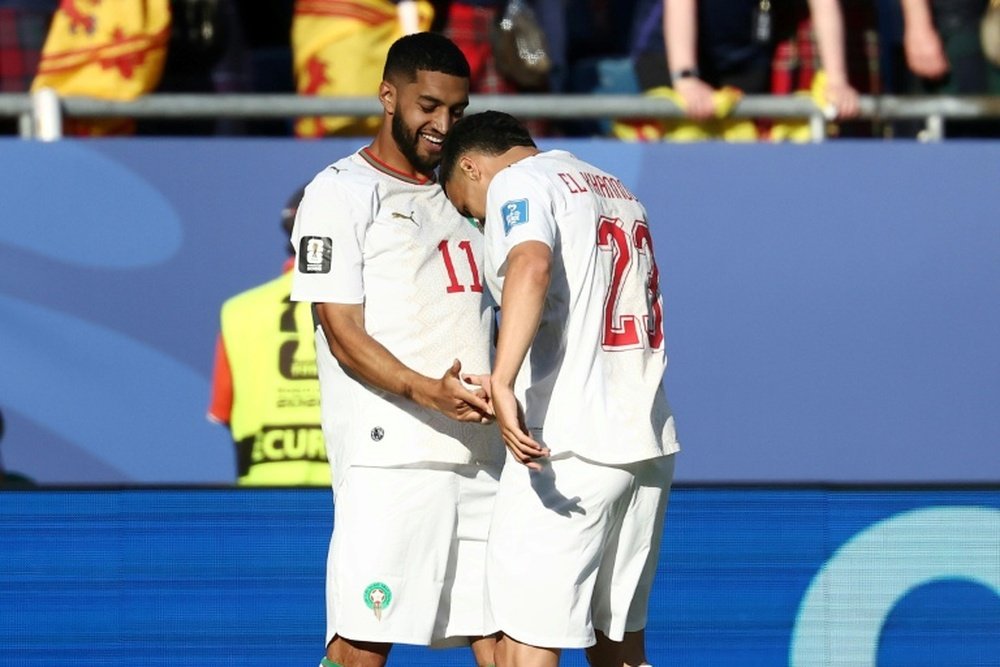Ismael Saibari (L) celebrates with teammate Bilal El Khannouss after scoring for Morocco against Scotland at the World Cup on Friday AFP FRANCK FIFE