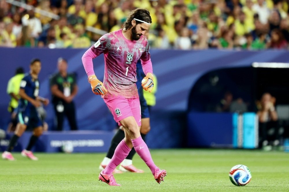 The kit of Brazilian goaltender Alisson Becker, seen here during the World Cup game against Haiti, has become a matter of political debate AFP/File CHARLY TRIBALLEAU