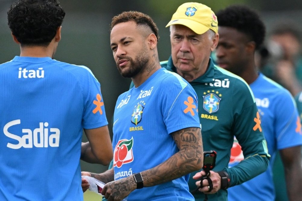 Neymar and Ancelotti. AFP Mauro PIMENTEL