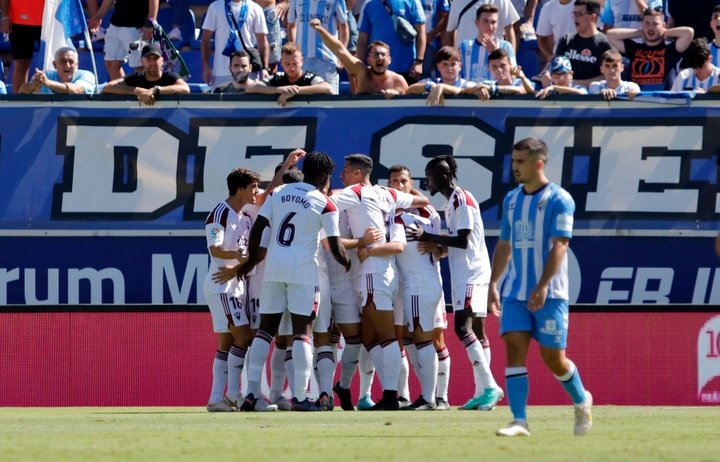 Los jugadores del Albacete celebran uno de los dos goles contra el Málaga CF en La Rosaleda. Marilú Báez