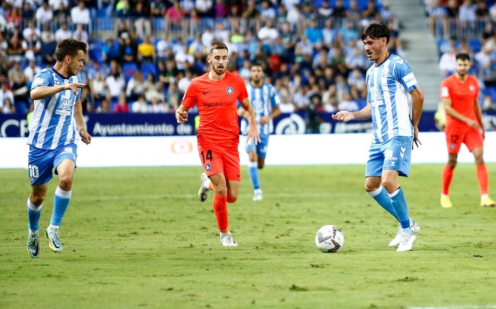 Jozabed y Febas, durante el partido del Málaga CF con el Andorra en La Rosaleda. Marilú Báez