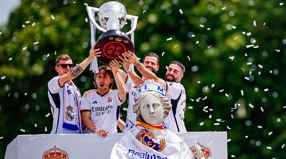 Los capitanes del Real Madrid, Kroos, Modric, Nacho y Carvajal, celebran el título de campeones de Liga.- Efe