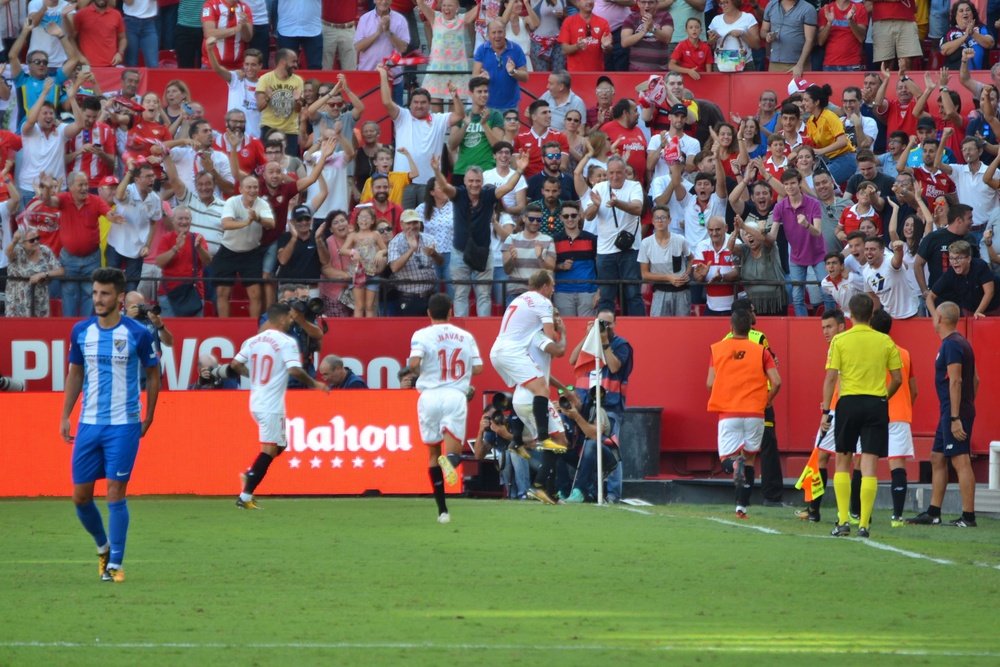 Sevilla go second by piling misery on Malaga. BeSoccer