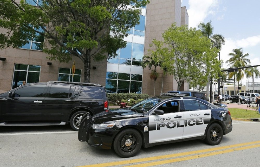 A Miami Beach police car sits outside the headquarters of CONCACAF after it was raided by FBI agents on May 27, 2015.