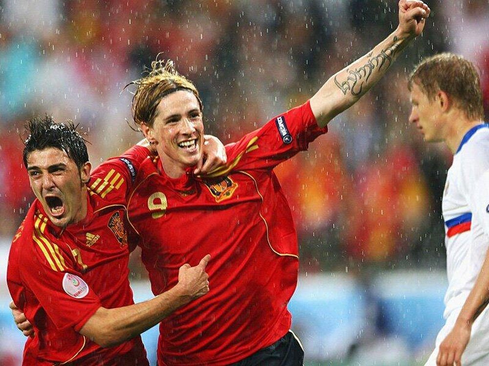 Villa et Torres, ex-internationaux espagnols, lors d'un match de l'Euro 2008. AFP