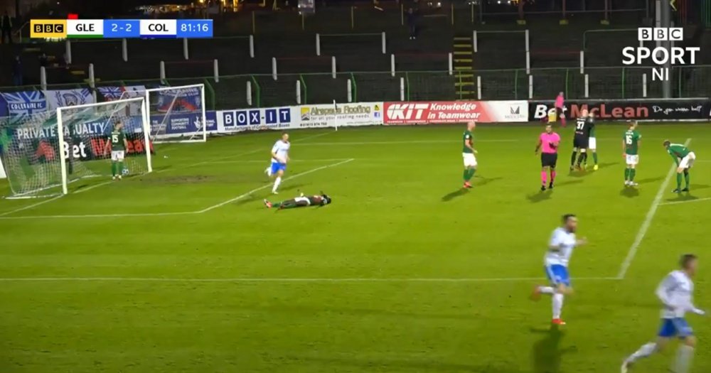 A goalkeeper hit his defender after conceding a goal. Screenshot/BBC