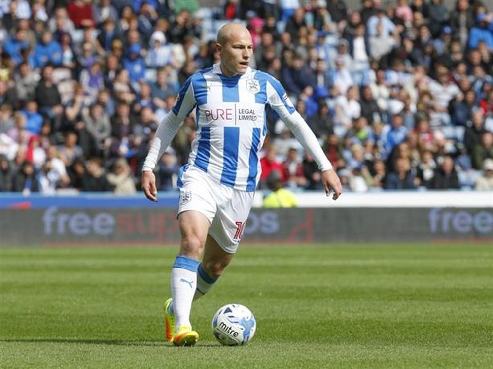 Aaron Mooy is very happy with Huddersfield's start in the Premier League campaign. HTAFC