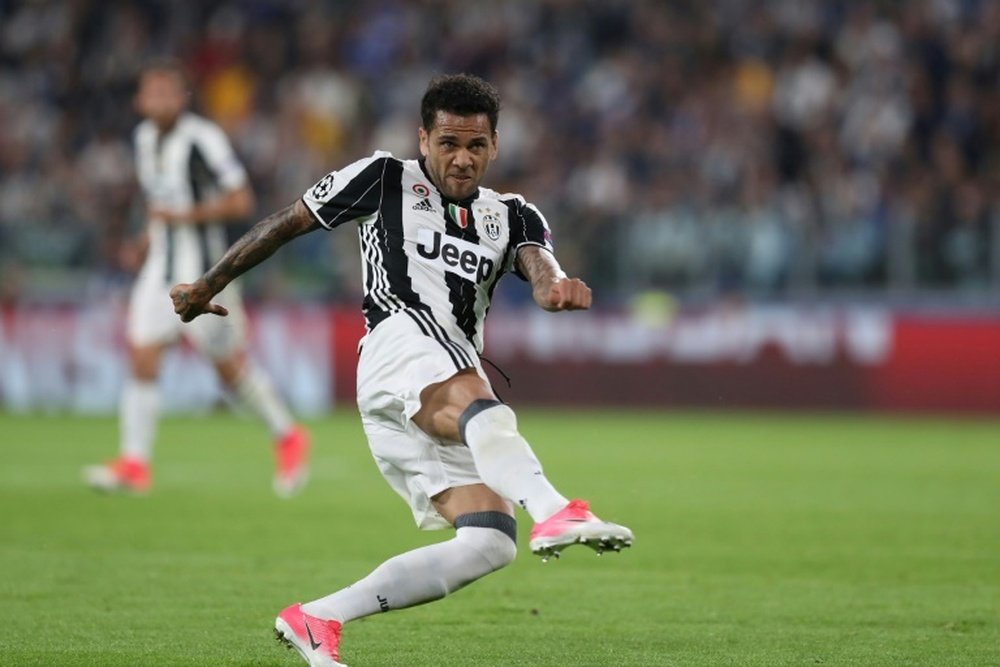 Dani Alves could have joined Liverpool but they refused to meet the £8m asking price. AFP