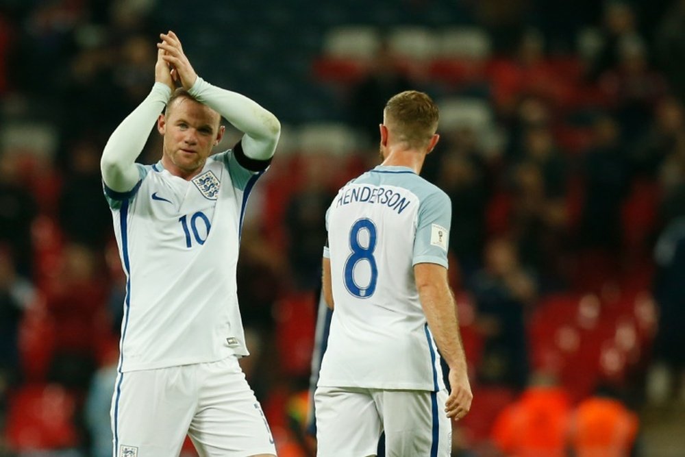 Englands striker Wayne Rooney celebrates after England won the World Cup 2018 qualification match agaiinst Scotland at Wembley stadium in London on November 11, 2016