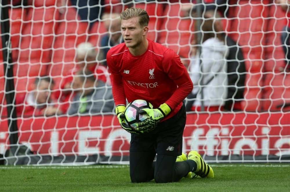 Liverpools goalkeeper Loris Karius warms up ahead of the English Premier League football match against Hull City at Anfield September 24, 2016