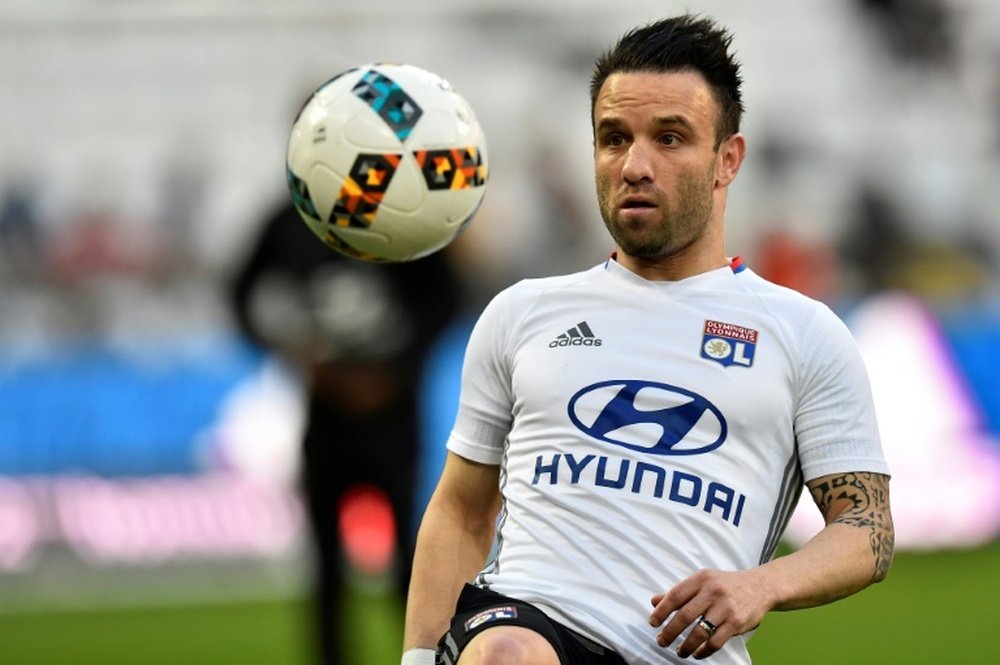 Mathieu Valbuena warms up whilst playing for Lyon