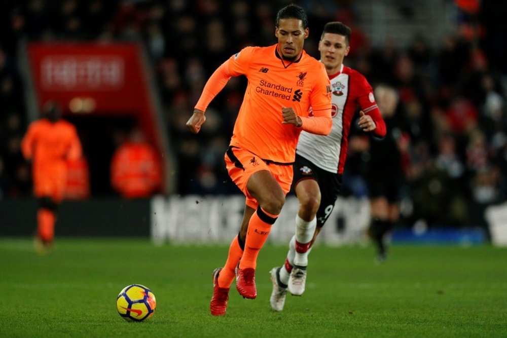 Van Dijk says there is more to come. AFP