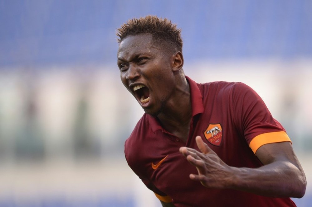 Romas defender from France Mapou Yanga-Mbiwa celebrates after scoring during the Italian Serie A football match Lazio vs AS Roma on May 25, 2015 at the Olimpic stadium in Rome