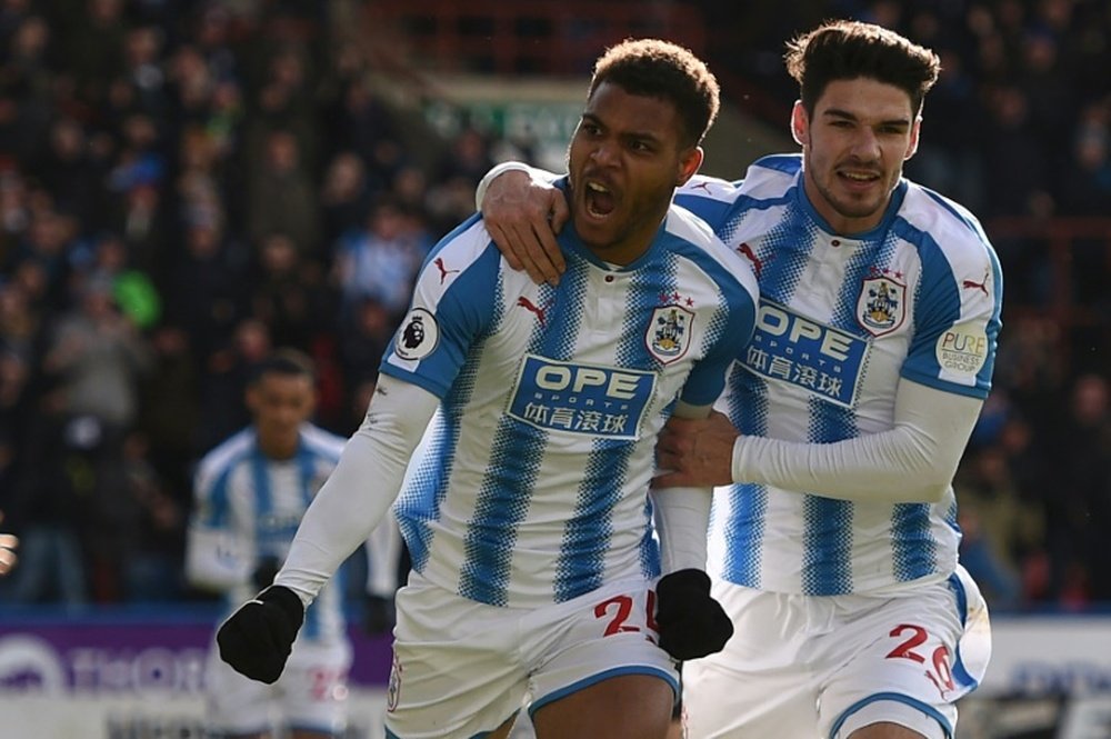Mounie bagged a brace in an important win for Huddersfield. AFP