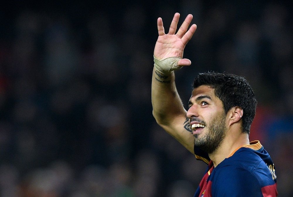 Barcelonas forward Luis Suarez celebrates a goal during the Spanish Copa del Rey (Kings Cup) football match FC Barcelona vs Valencia CF at the Camp Nou stadium in Barcelona on February 3, 2016