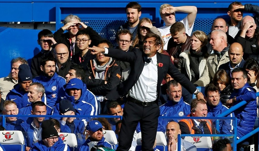 Chelseas head coach Antonio Conte shouts instructions to his players. AFP