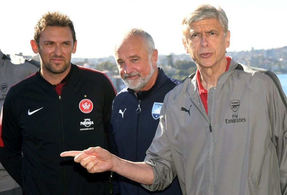 Popovic (left) will become the new Karabukspor coach. AFP