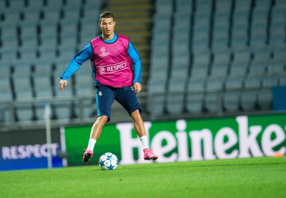 Real Madrids Portuguese forward Cristiano Ronaldo takes part in a training session at the Swedbank Stadion, on September 29, 2015, on the eve of the UEFA Champions League Group A football match between Malmo FF and Real Madrid CF