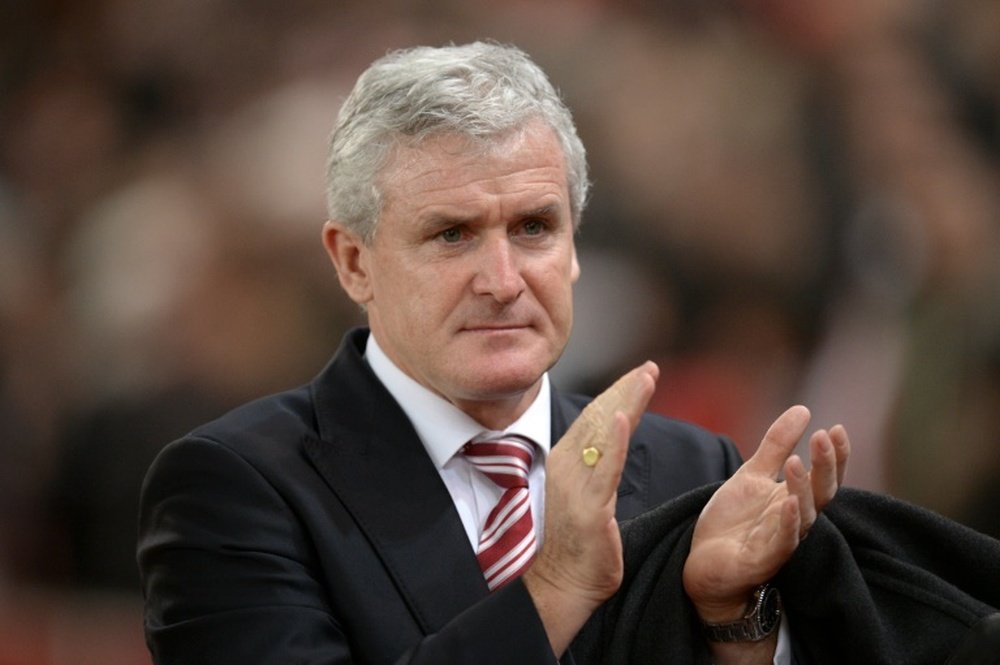 Mark Hughes will be without goalkeeper Jack Butland for the game. AFP