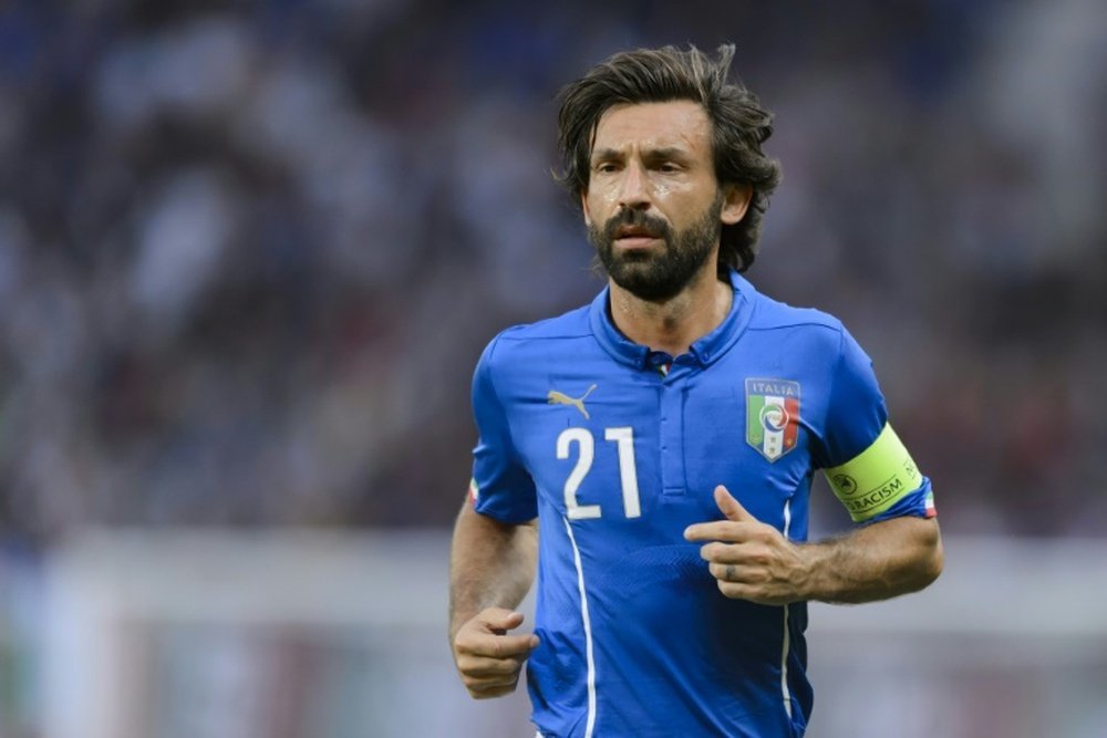 Italys midfielder and captain Andrea Pirlo looks on during a friendly match against Portugal at the Stade de Geneve on June 16, 2015 in Geneva