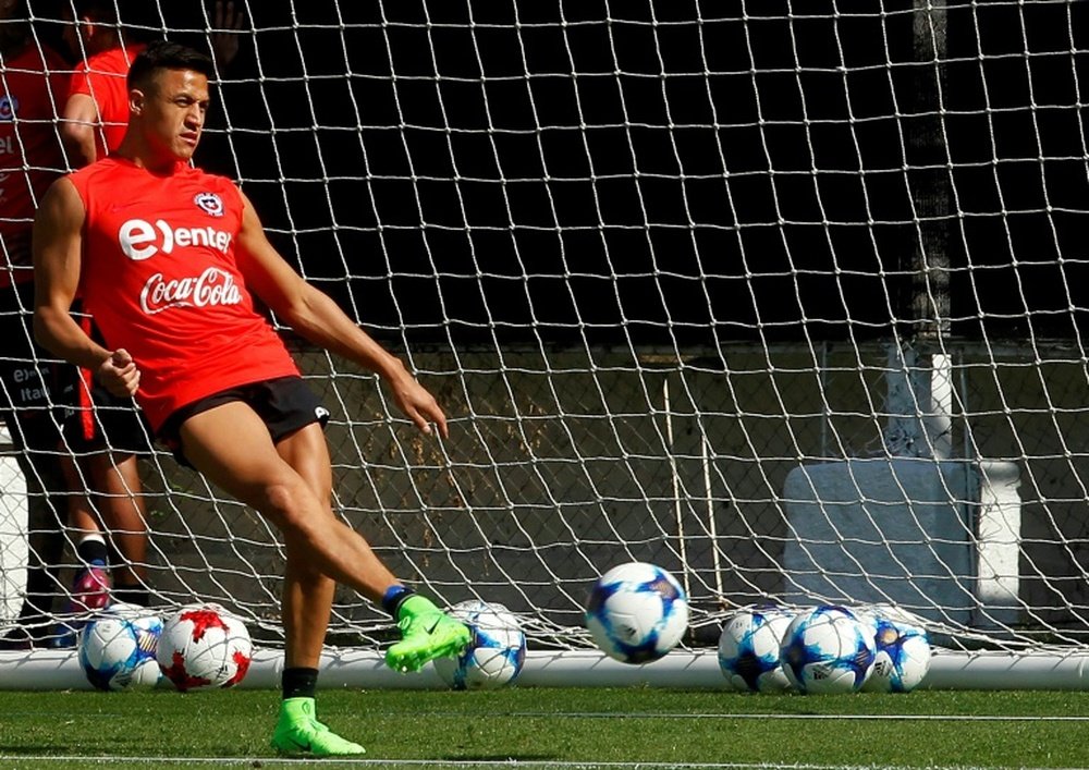 Sanchez trained with Chile ahead of World Cup qualifiers.