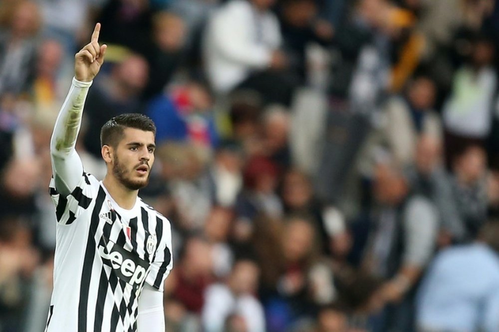 Juventus forward Alvaro Morata celebrates after scoring during an Italian Serie A football match against Bologna on October 4, 2015