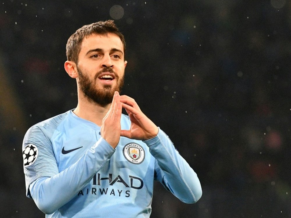 Bernardo Silva is unwilling to rule United out of the Premier League race. AFP