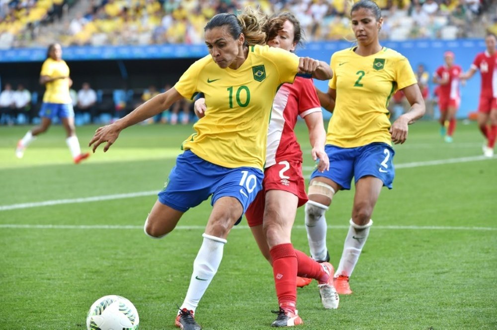 Marta in action during Brazil's bronze medal match against Canada. AFP