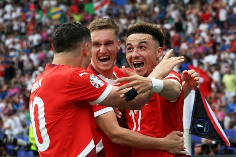 Switzerland beat reigning Euro champions Italy to reach quarter-finals