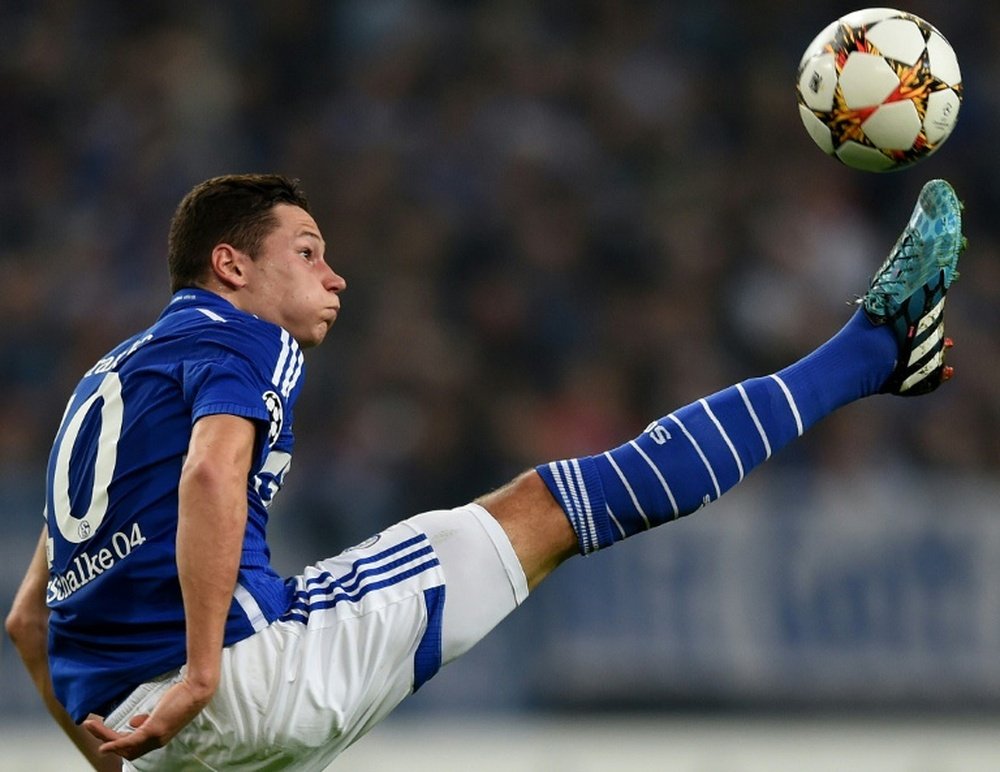 Julian Draxler, pictured in action on September 30, 2014, will join VfL Wolfsburg on a five-year contract