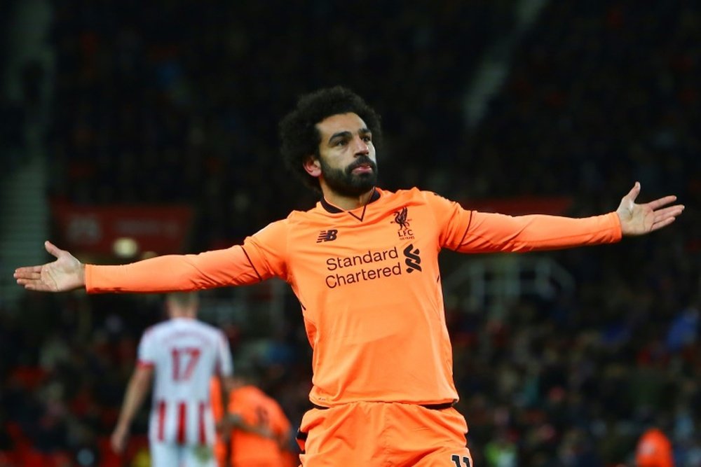 Salah at double as Liverpool claim fifth. AFP