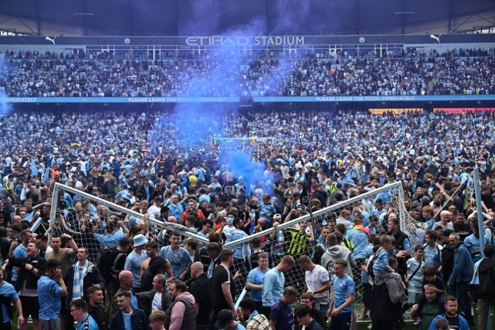 Greater Manchester Police charge two fans after Etihad invasion