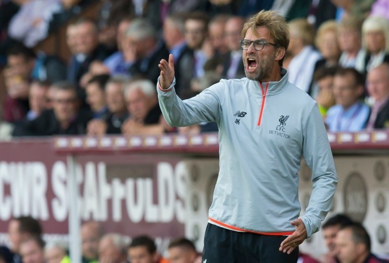 Liverpools manager Jurgen Klopp yells from the touchline at Turf Moor in Burnley, north west England on August 20, 2016