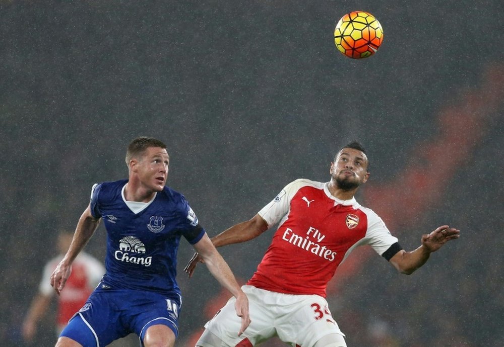 McCarthy (left) vying with Francis Coquelin in a game against Arsenal before his injury. AFP