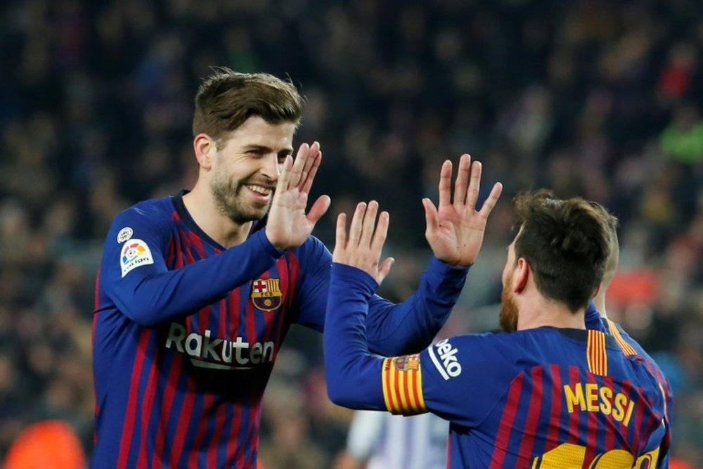 Gerard Piqué fez revelações sobre momento em que Messi tentou sair do Barcelona. AFP