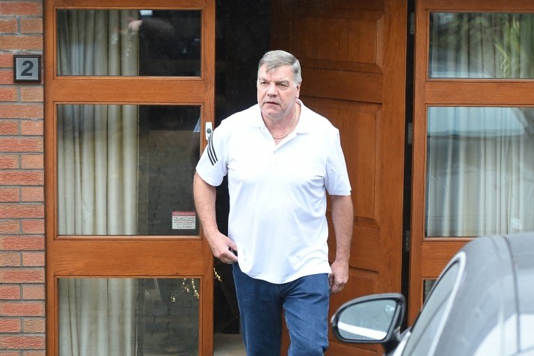 Former England national football team manager Sam Allardyce leaves his home in Bolton. AFP