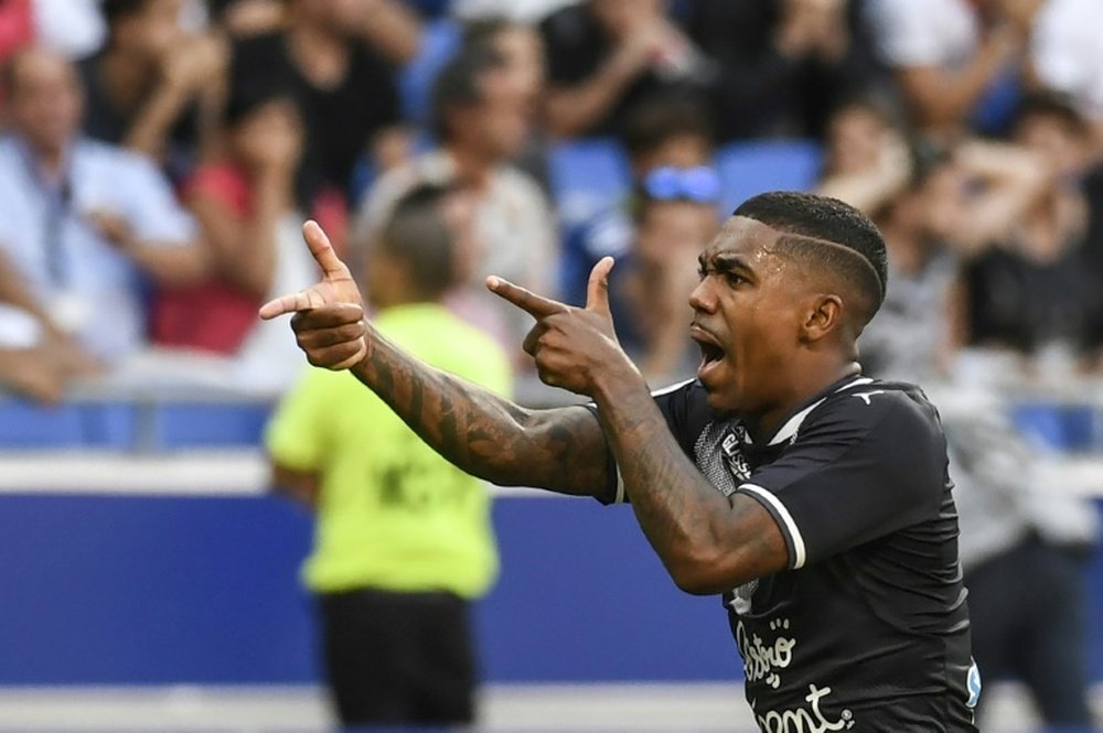 Bordeaux's forward Malcom celebrates after scoring a goal during the L1 football match against Olympique Lyonnais August 19, 2017