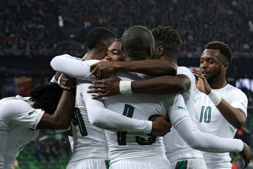 England-based pair give Ivory Coast win in Russia. AFP
