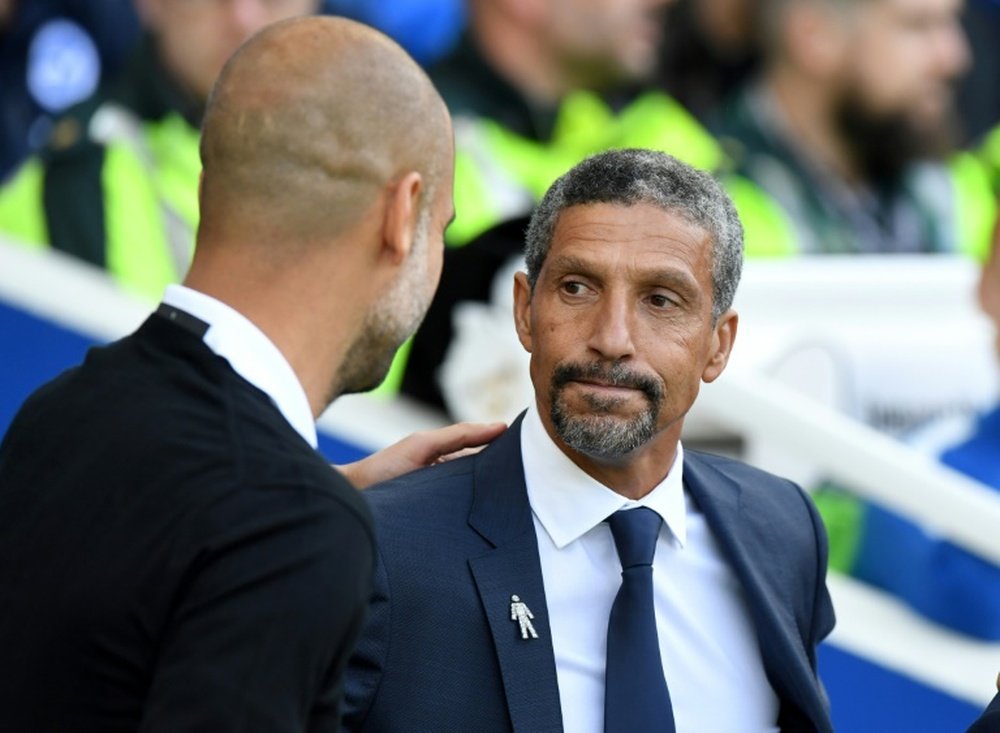 Hughton's Brighton finished second in the Championship last season. AFP